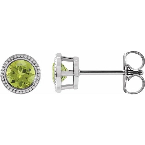 Firouz 0.52 Carat Peridot Bezel Set 